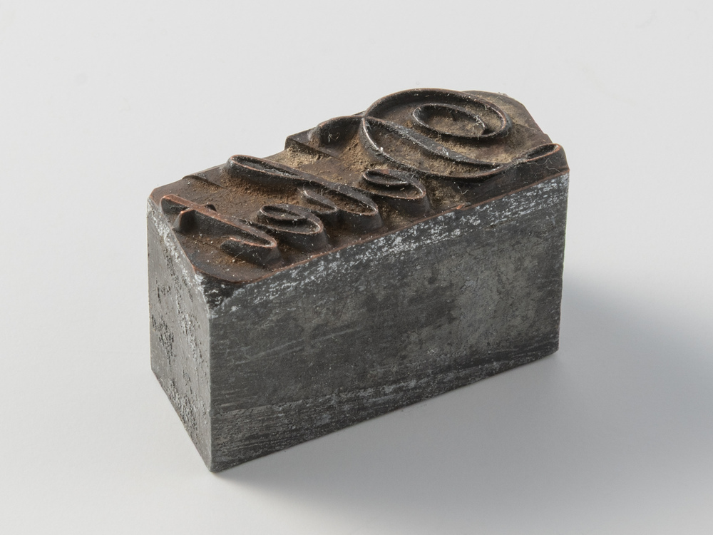 Kleine cliché met opdruk