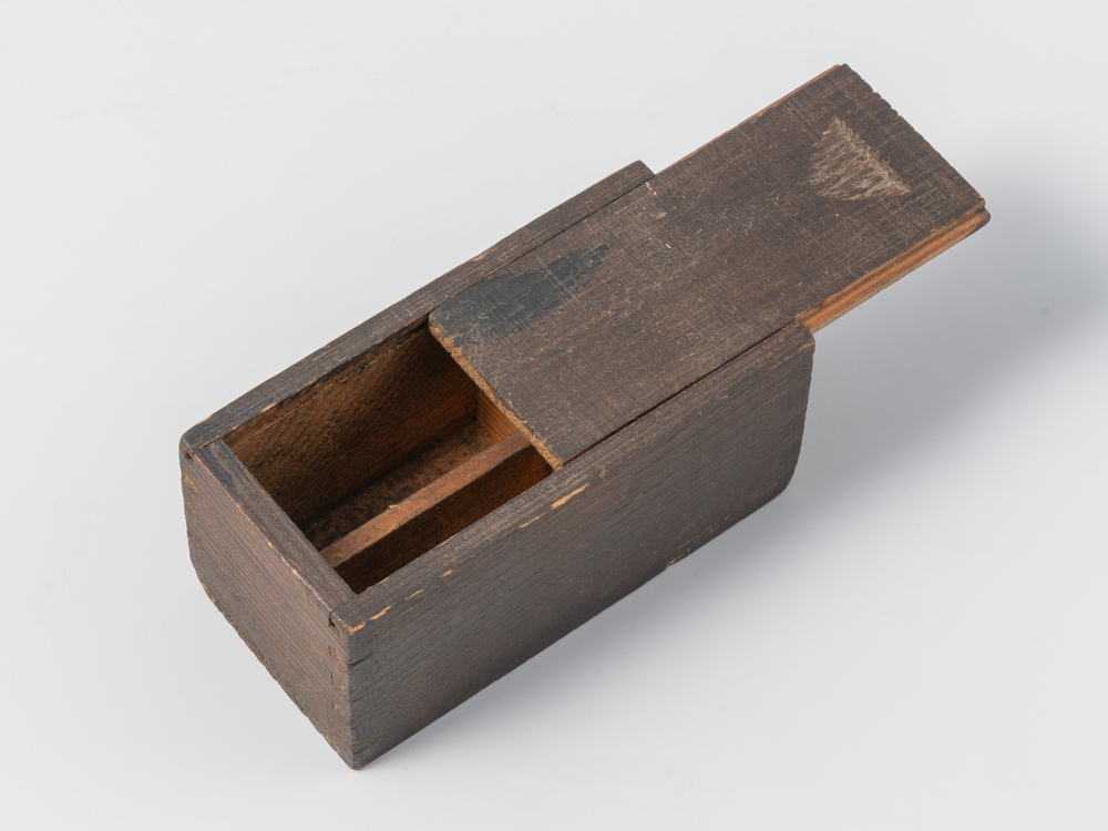 Doosje voor (vermoedelijk) nummeroteur