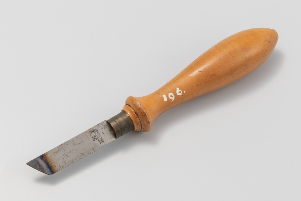 Mes om afbeeldingen in hout te snijden