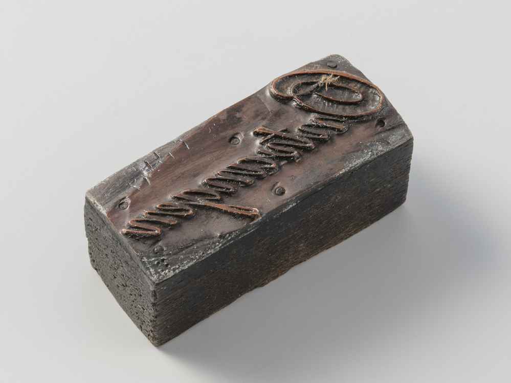 Kleine cliché met opdruk