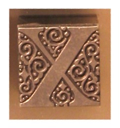 Hoofdletter in een ornament