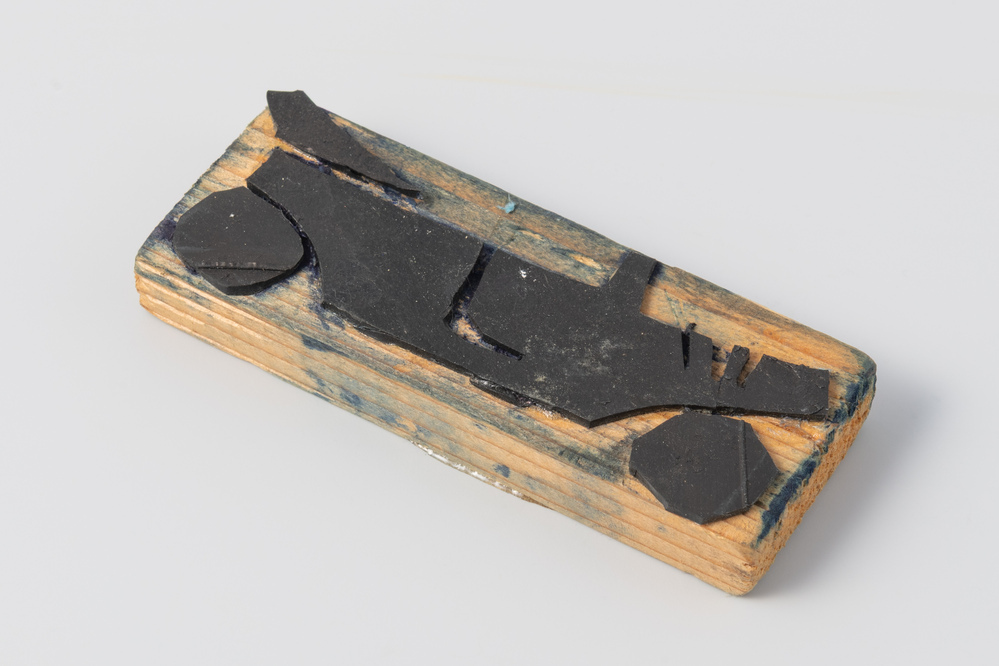 Drukvorm gemaakt van een autobinnenband in de vorm van een raceauto