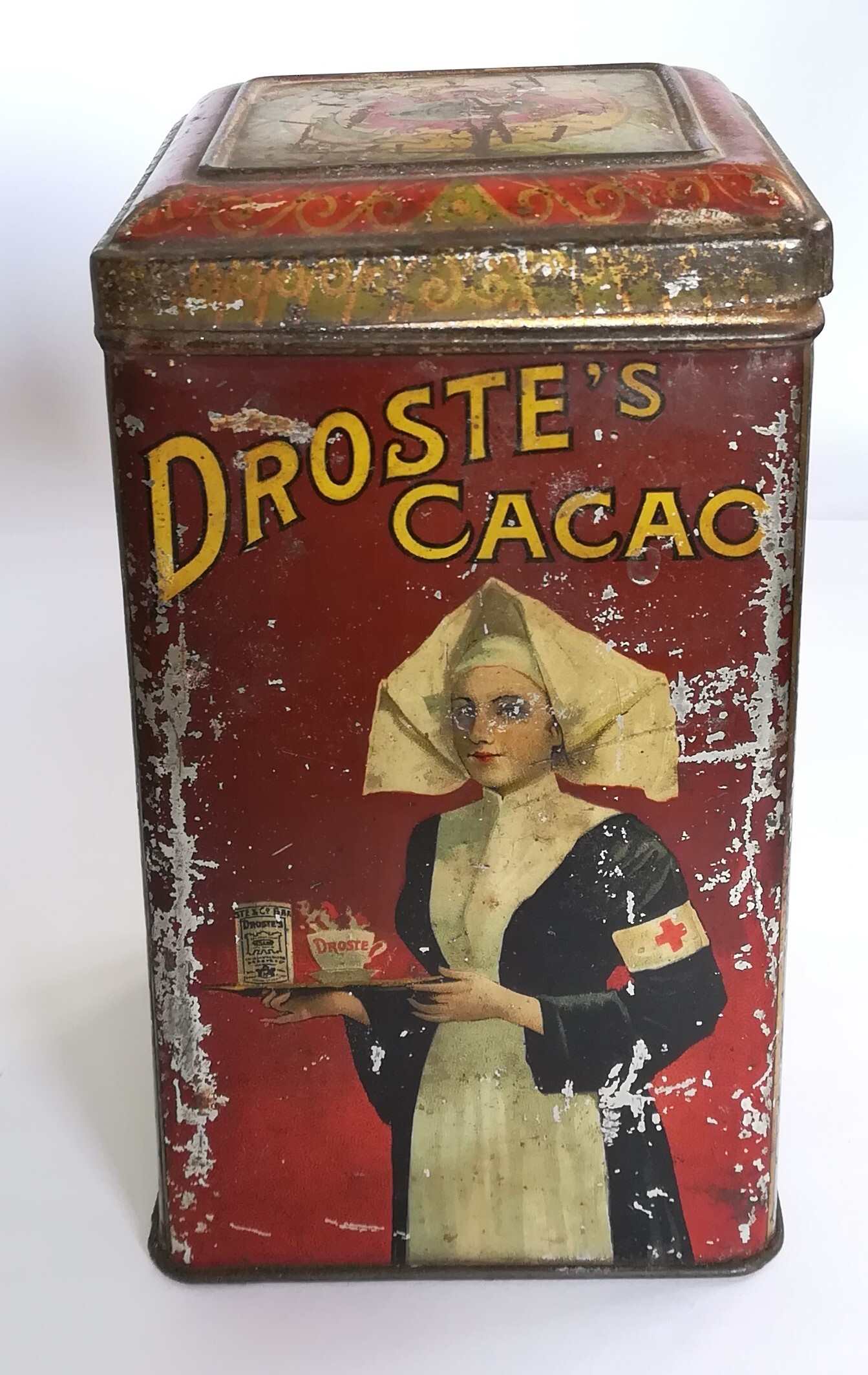 Droste Cacaoblik met verpleegster, zonder Droste effect, met treinscène en rood kruisje