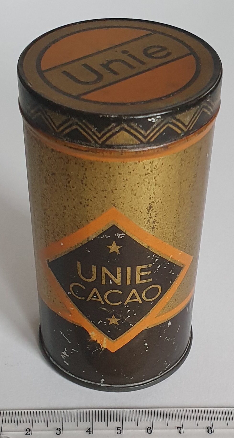 Unie cacaoblik van 100 gram, goudkleurig.