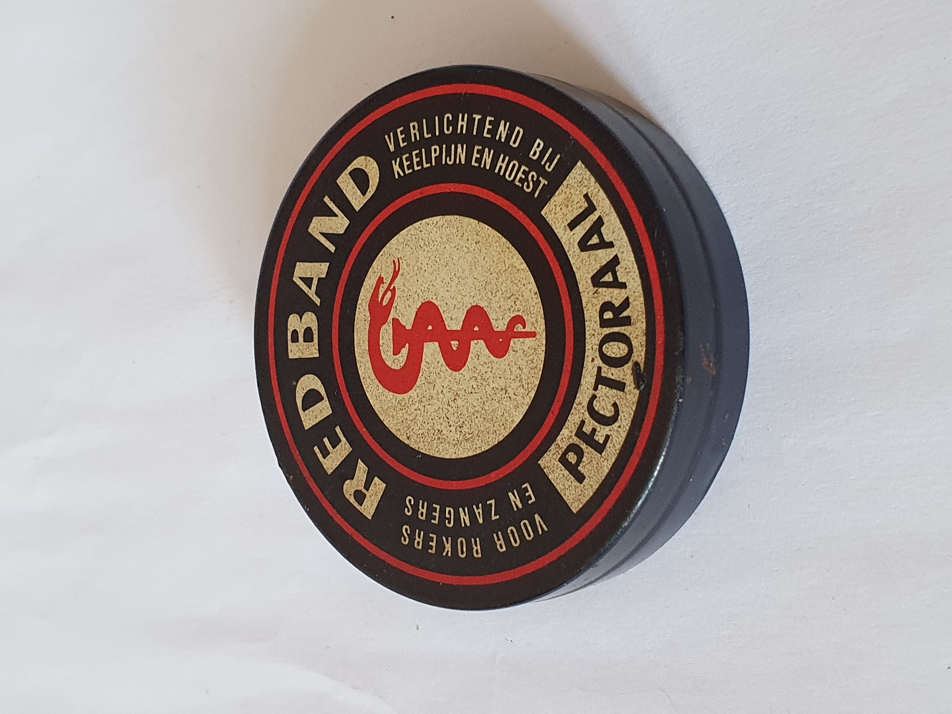 Redbandblikje, rond, voor hoestpastilles, merknaam pectoraal.