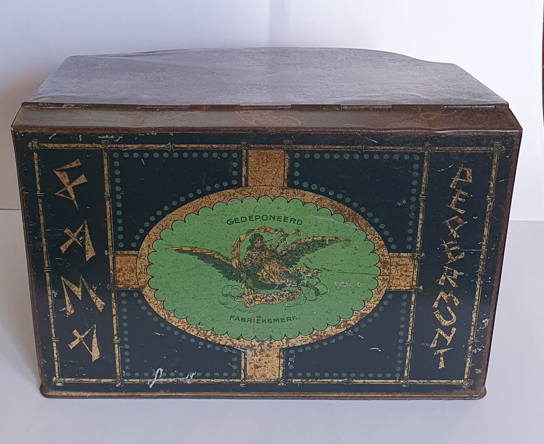 Faam Pepermunt winkel-of toonbankblik met scheef aflopend deksel.