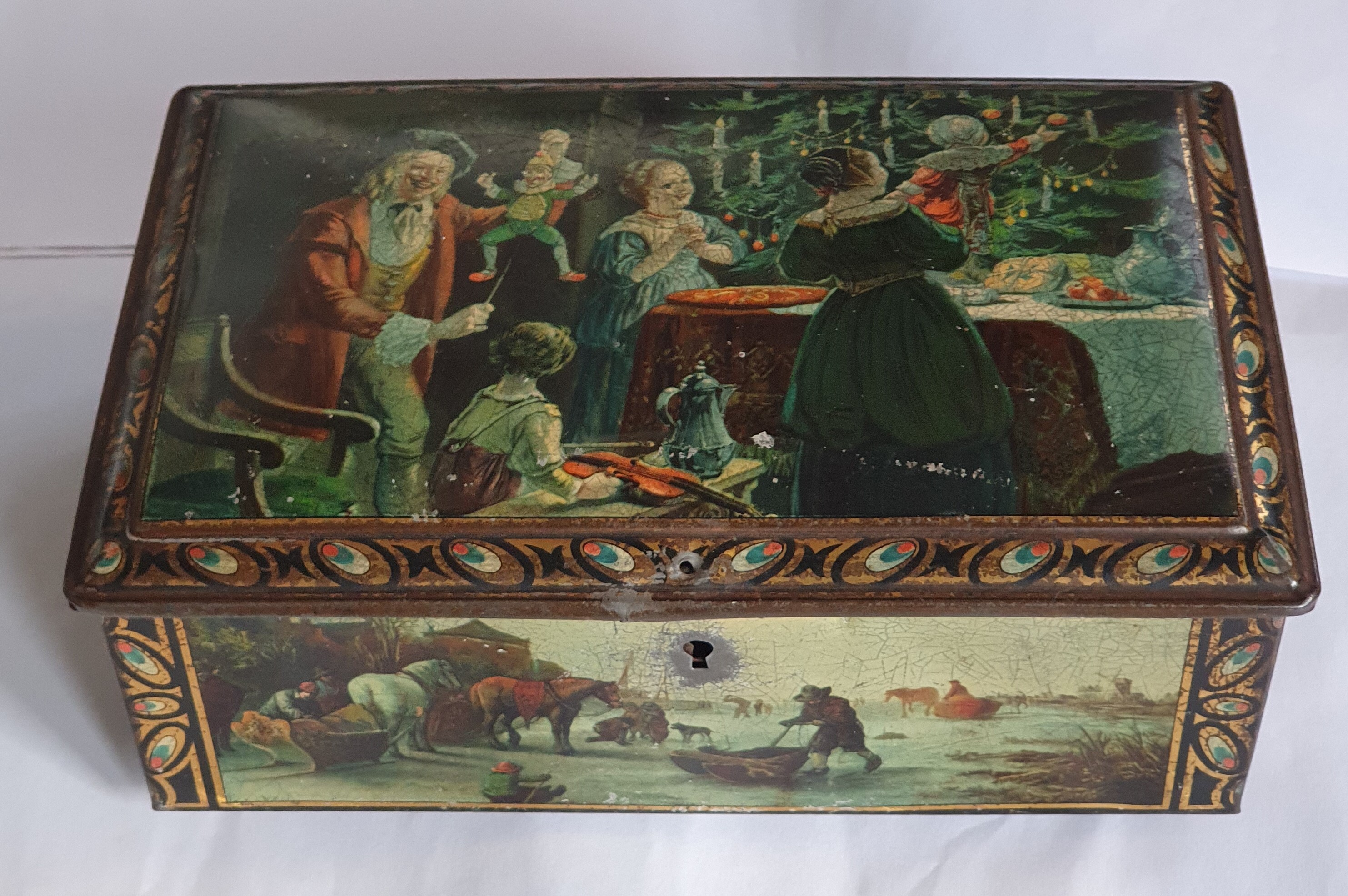 Kerstblik, bewaarblik met afbeelding van gezin en kerstboom