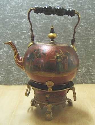 Tinnen chocoladekan met komfoor.