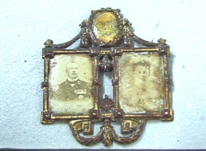 Miniatuurportretjes van prins Hendrik en koningin Wihelmina.