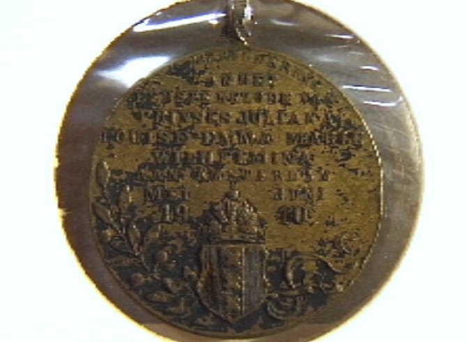 Penning t.g.v. eerste bezoek van Juliana aan Amsterdam.