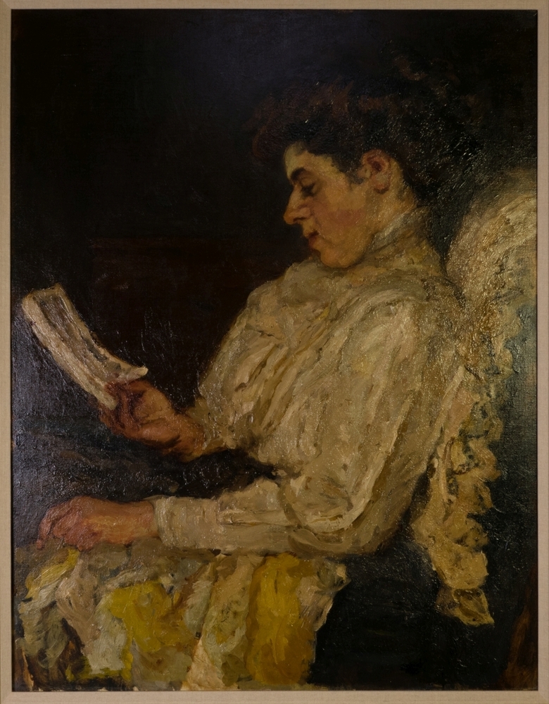 Portret van een lezende vrouw.