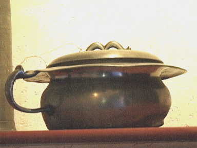 Tinnen po met deksel.