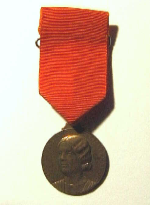 Penning t.g.v. 25ste verjaardag prinses Juliana, met busteportret naar links, en randschrift.