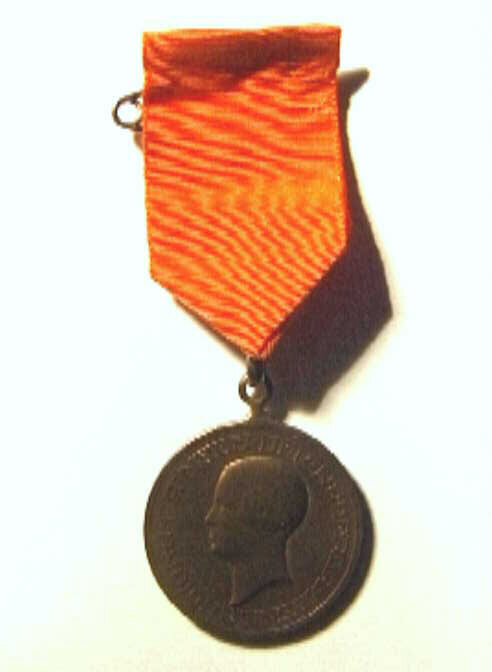 Penning t.g.v. 18de verjaardag Juliana, met portret naar links en randschrift.