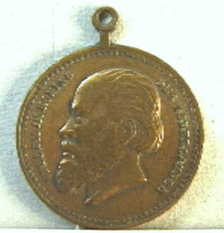 Penning met portretkop naar links van Willem III.