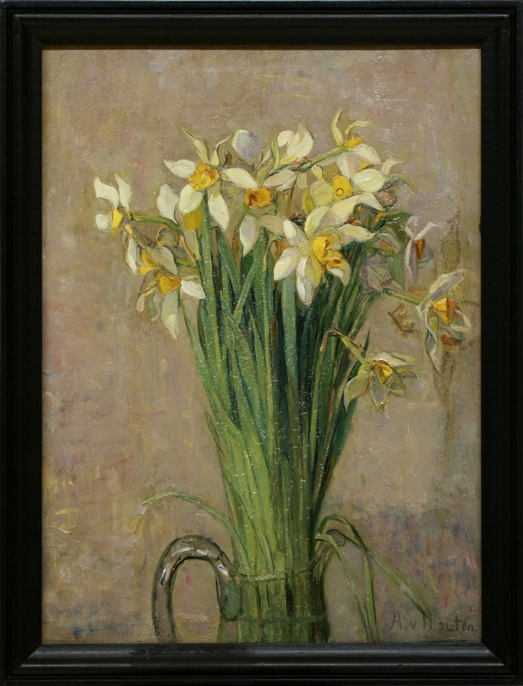 Narcissen in glazen kan.