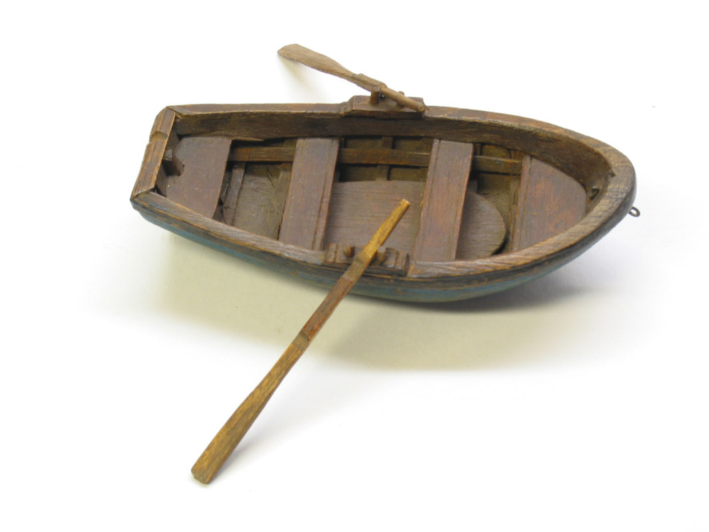 Scheepsmodel van een vlet met roeispanen