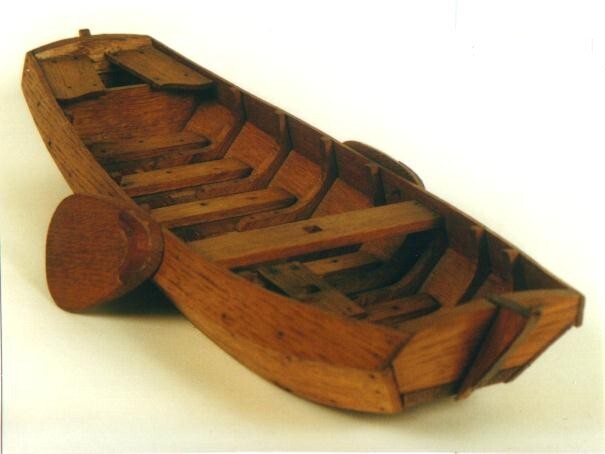 Model van een ongetuigde zeilschouw