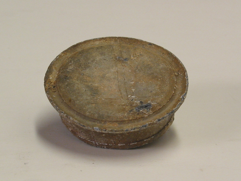 Deksel van flesje van het rantsoen sterke drank.  Afkomstig uit het wrak van de Hollandia.