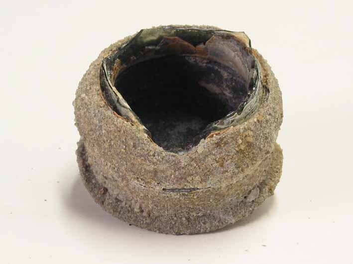 Deksel van flesje van het rantsoen sterke drank. Afkomstig uit het wrak van de Hollandia.