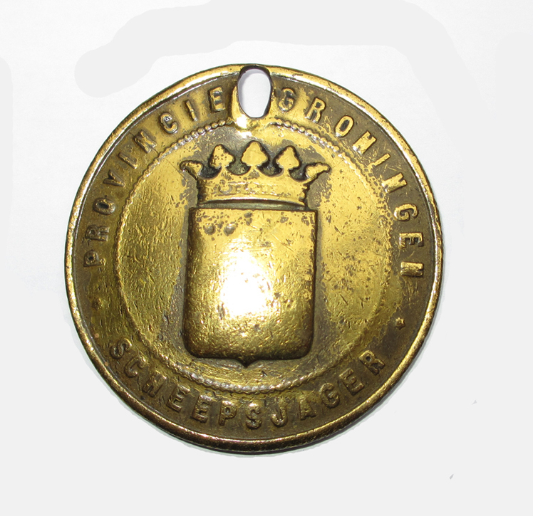 Scheepsjagerspenning prov. Groningen nr. 144 uitgegeven aan Jan van der Veen uit Veendam.