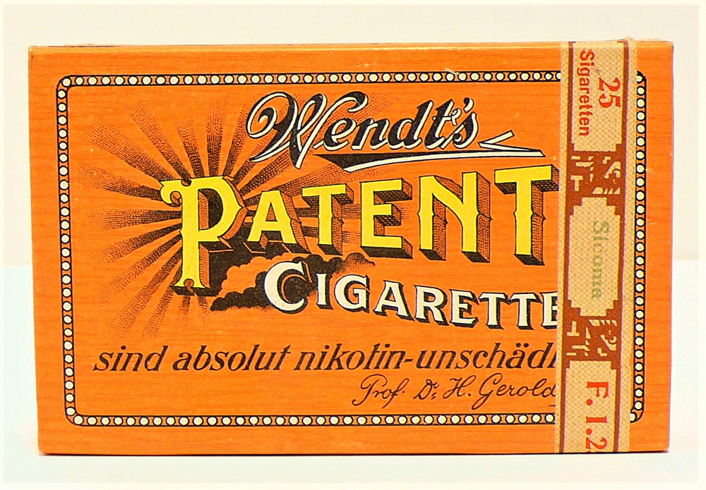 Sigarettenpakjes "Wendt's patent cigaretten. Sind absolut nikotin-unschädlich." Oranje pakje met 25 sigaretten