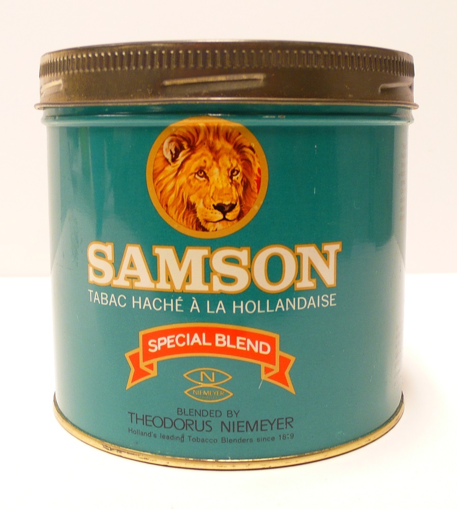 Tabaksblik van het merk Old Amsterdam, geproduceerd door Theodorus Niemeijer te Groningen