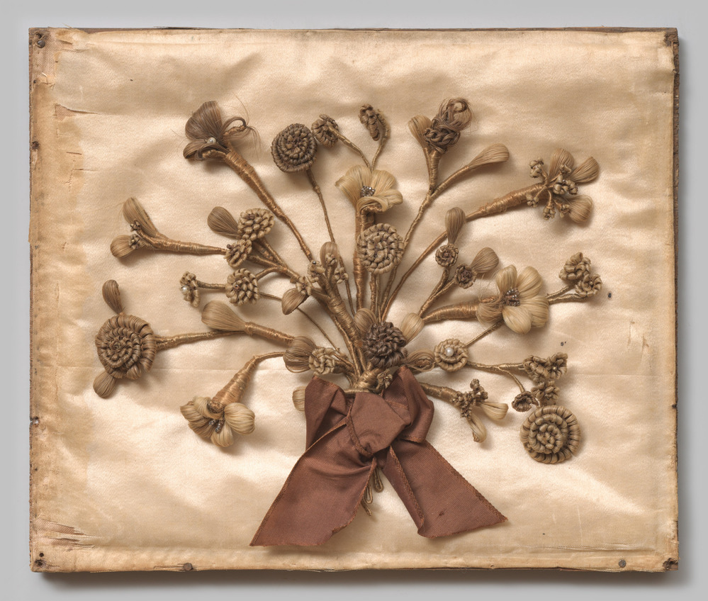 Haarwerk in boeketvorm in groene doos