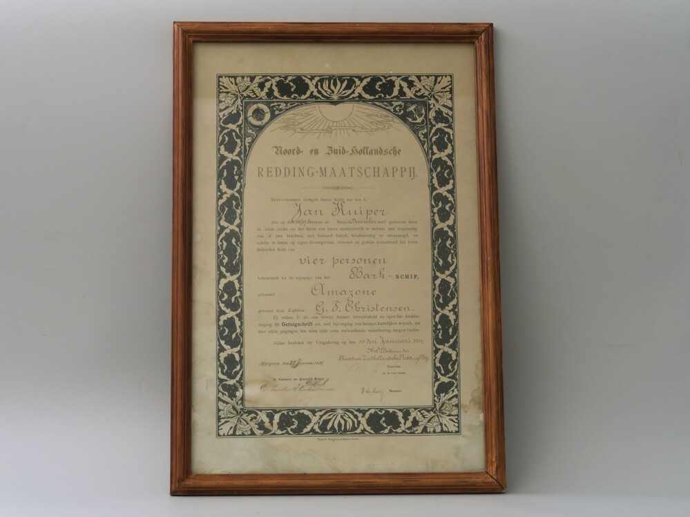 Getuigschrift, ingelijst, achter glas
