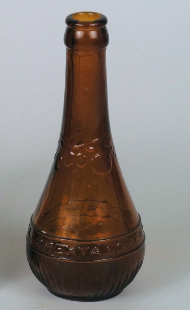 Kleine opekta fles van bruin glas