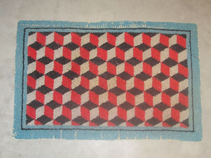 spekmat met afbeelding blokmotief in de kleur zwart, rood, grijs en blauw. afkomstig van Andries Stade, schipper van de afhaalbotter, geboren 1871