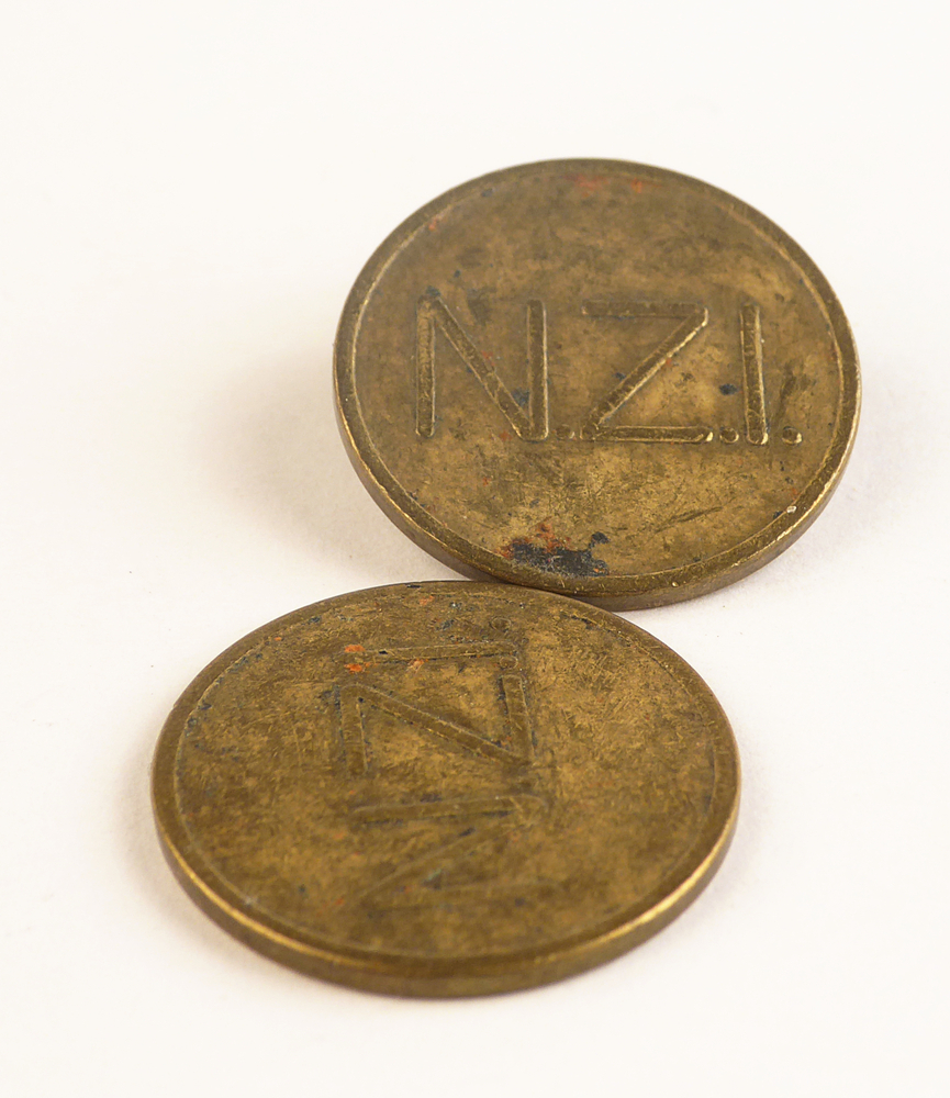 ronde messing penning met geslagen inscriptie N.Z.I. ( Nationale Zetmeel Industrie )