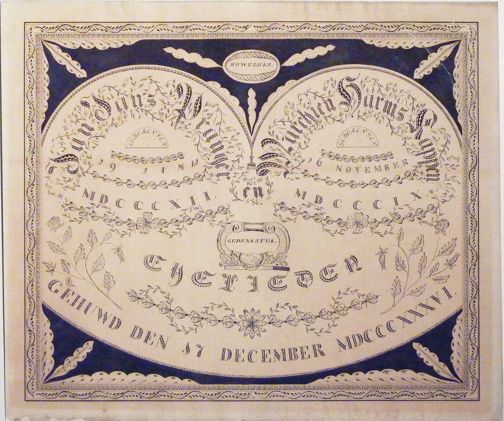 papier in houten lijst met decoraties van rankwerk en opschrift Gedenkstuk bij het huwelijk van Jan Jans Pranger geb 29 Juni 1812 en Marchien Harms Kappen geb 1809.Getrouwd op 17 december 1836.