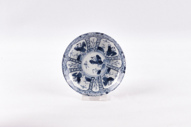 Kop en schotel van Chinees porselein met blauwe beschildering